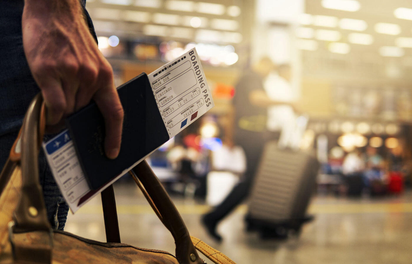 ssss boarding pass Traveler holding ssss boarding pass and passport in busy airport, symbolizing the start of a journey
